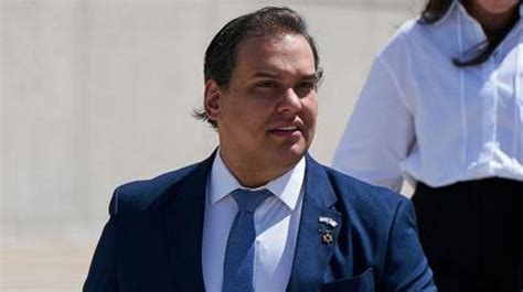 George Santos faces prison after pleading guilty to fraud .